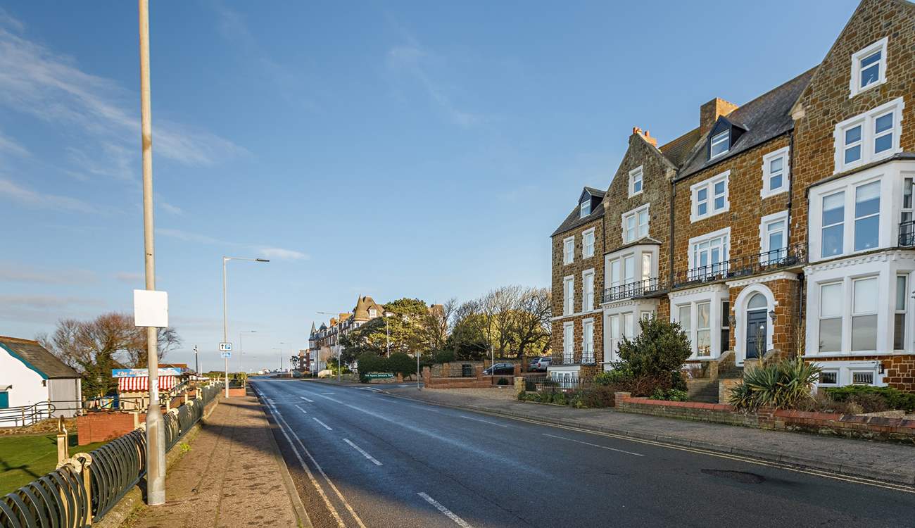 Far left of the row is The Garden Flat on the lower ground floor, image shown looking towards Old Hunstanton.