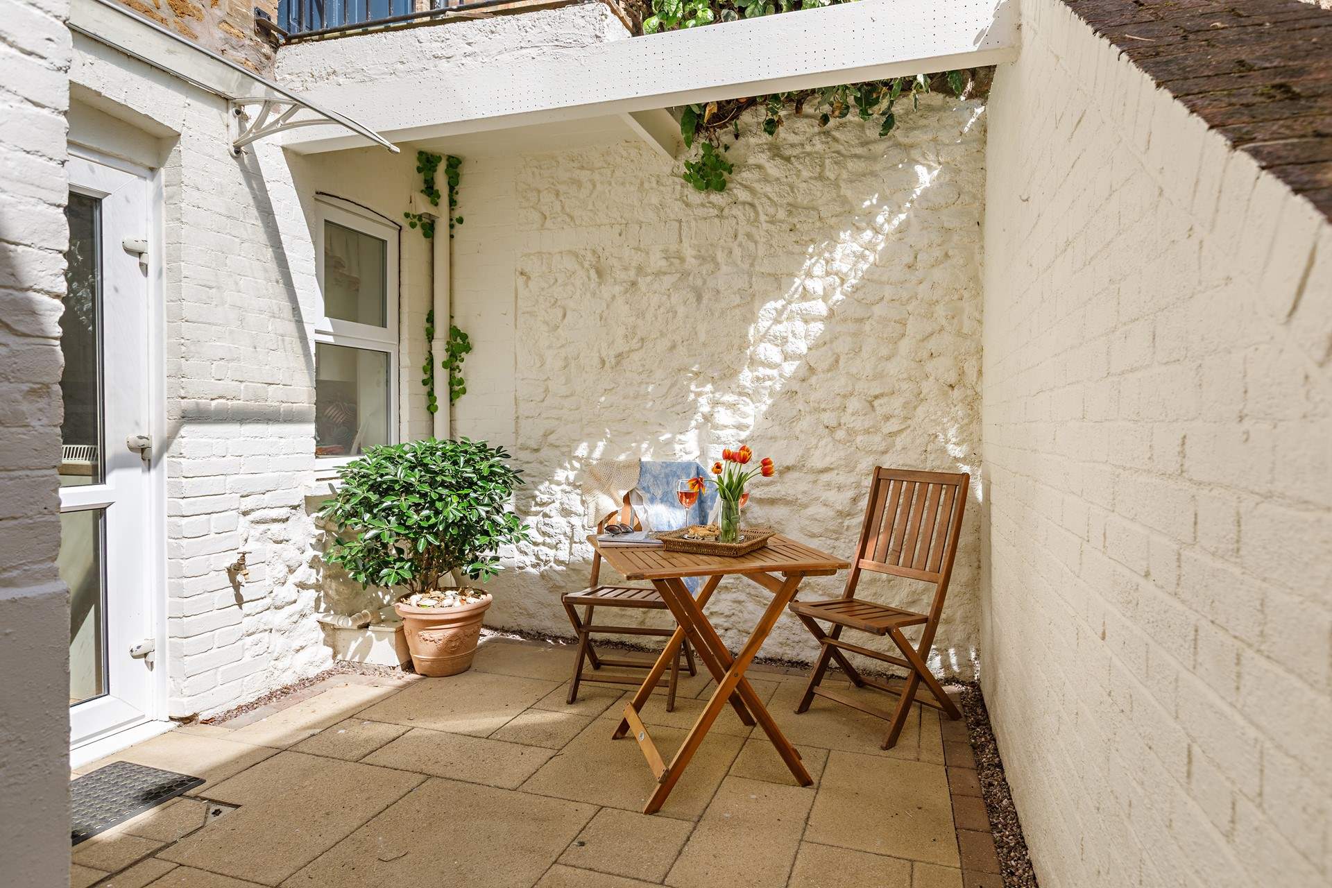 Your secluded patio, perfect for alfresco dining. 