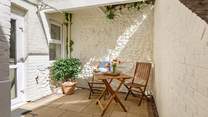 Your secluded patio, perfect for alfresco dining. 