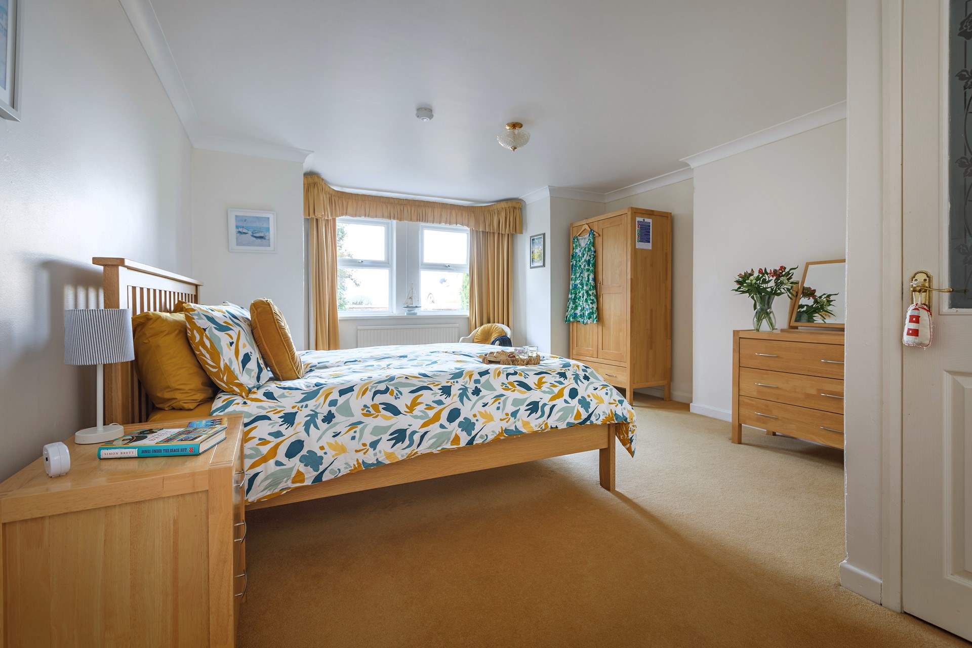 The main bedroom is a lovely king-size double bed with private en-suite shower-room.