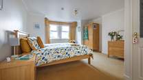 The main bedroom is a lovely king-size double bed with private en-suite shower-room.