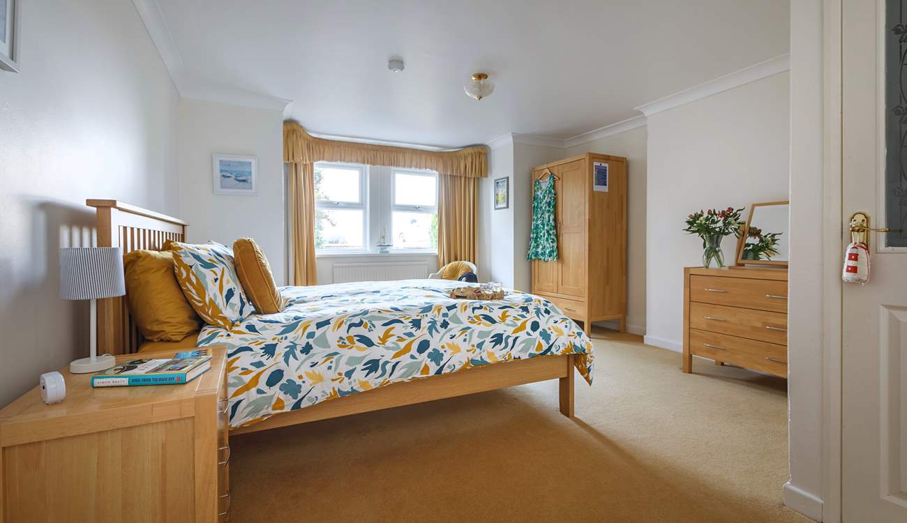 The main bedroom is a lovely king-size double bed with private en-suite shower-room.