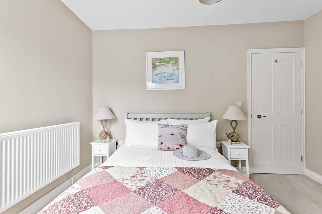 A king-size bed awaits in bedroom 1.