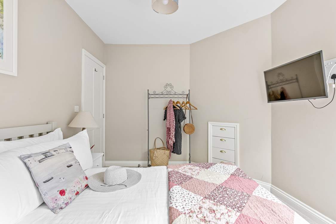 Snuggle under the covers and catch up on the morning news or a late night film.
