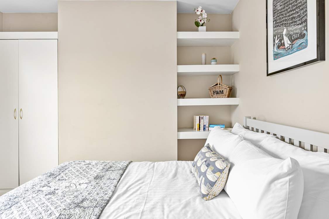 There's a double bed for the guests staying in the second bedroom.
