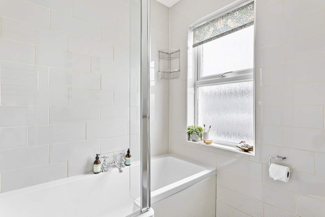 The family bathroom also has a shower above the bath.