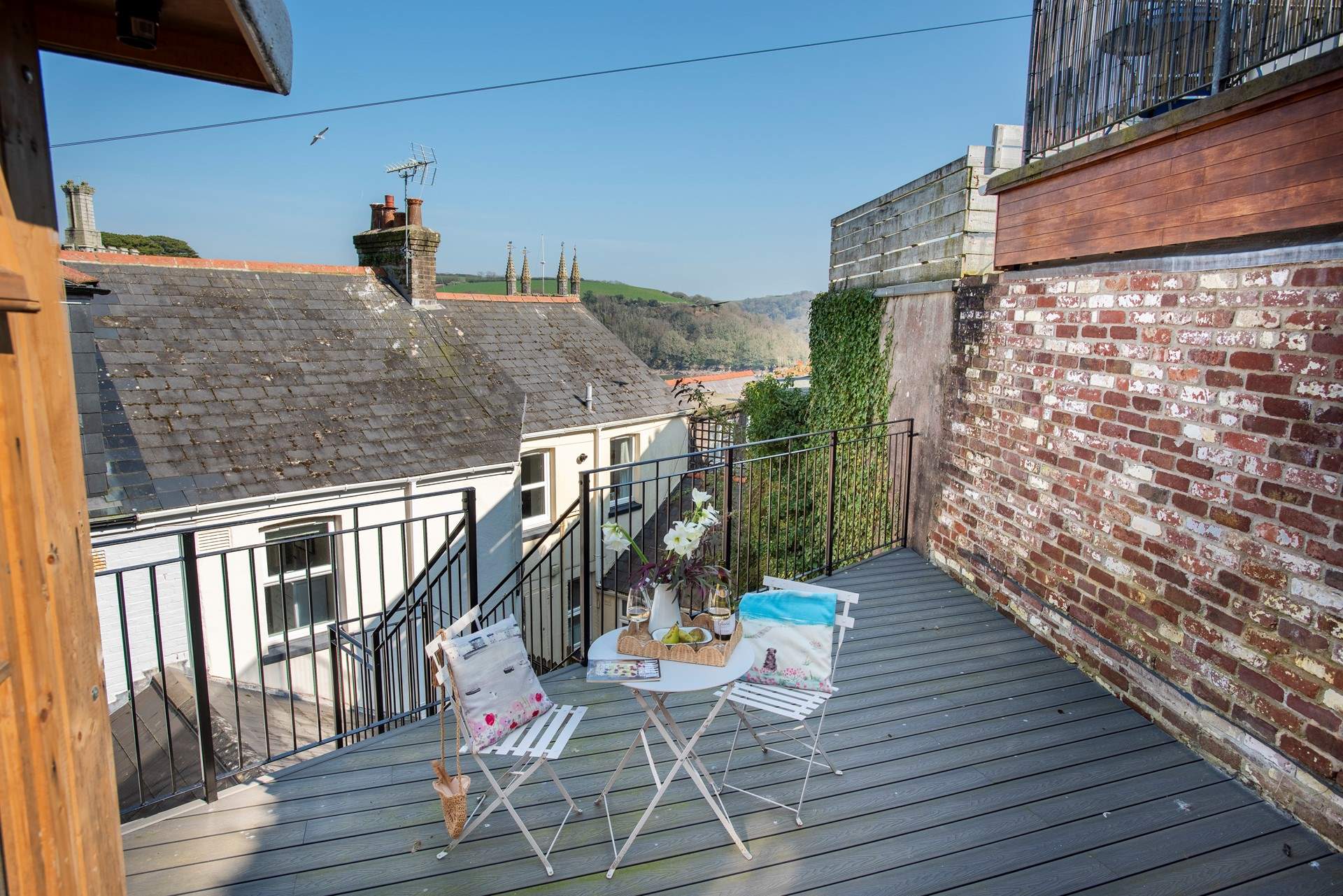 The raised decking area is a real bonus , offering glimpses of the river as you sit outside to enjoy your favourite tipple or morning cuppa.