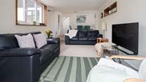 Enjoy a movie together after exploring the nearby coastal path or a day on the beach. 