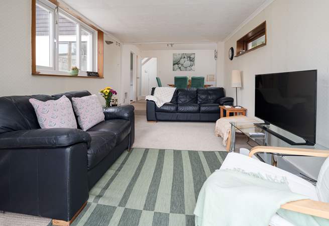 Enjoy a movie together after exploring the nearby coastal path or a day on the beach. 