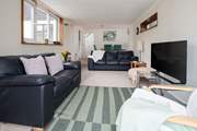 Enjoy a movie together after exploring the nearby coastal path or a day on the beach.