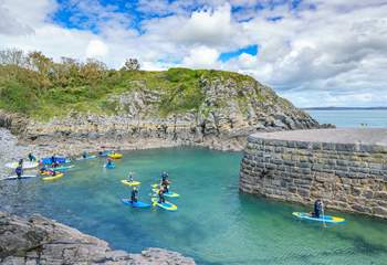 Spend time on the water and try stand up paddle boarding at Stackpole Quay. The Stackpole Inn serves the tastiest Sunday lunch.  