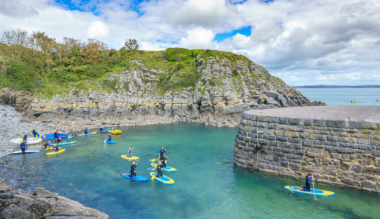 Spend time on the water and try stand up paddle boarding at Stackpole Quay. The Stackpole Inn serves the tastiest Sunday lunch.  