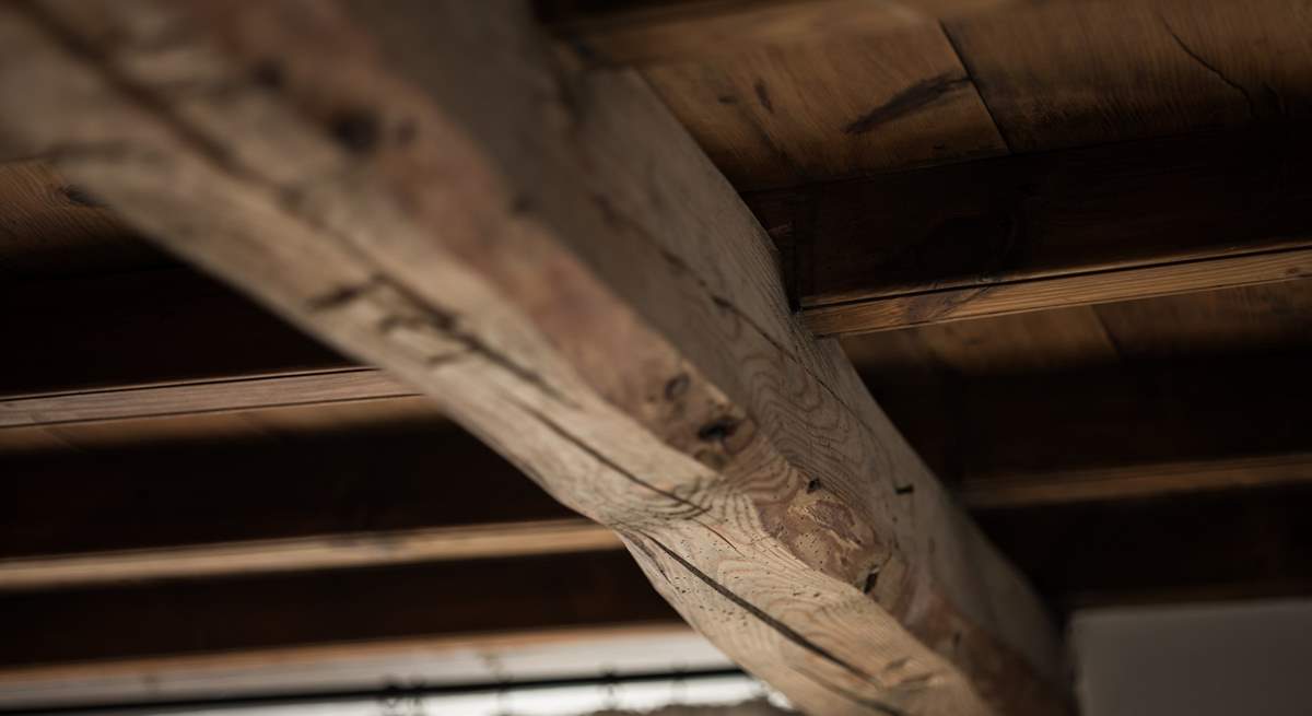 Admire the original beams.