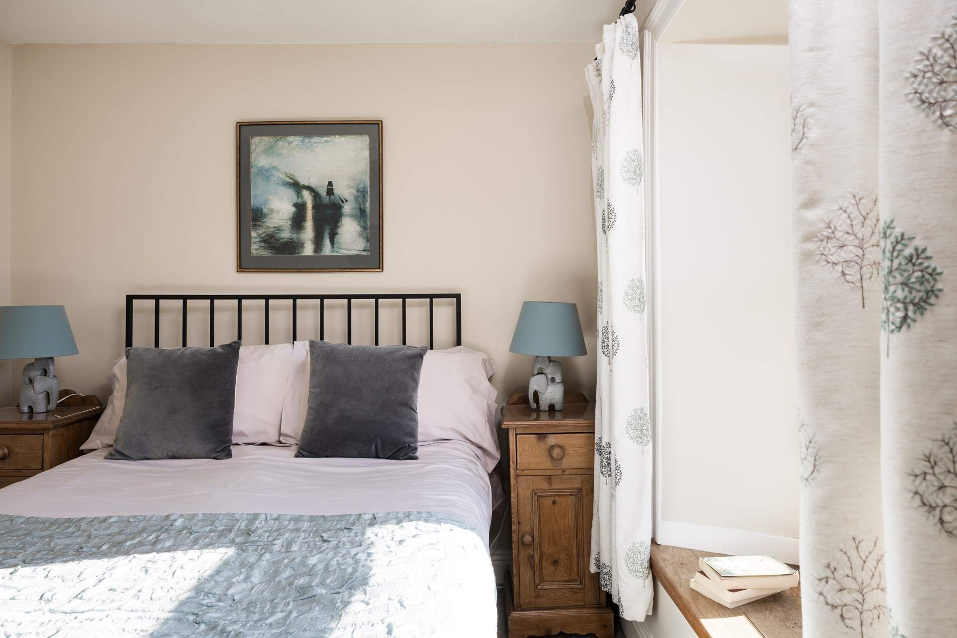 The window ledge is perfect for curling up and reading a book while looking out over the village to the hills.