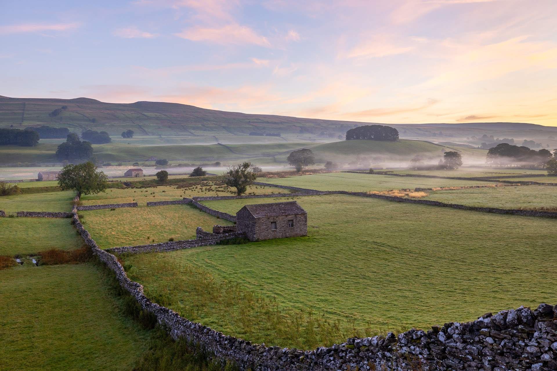 Experience a misty morning in the Yorkshire Dales.