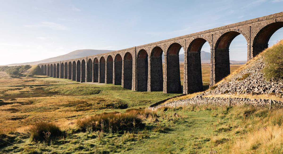 While driving over the hills catch a glimpse of the magnificent Ribblehead viaduct.