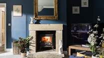 Chill out in front of a roaring fire while watching your favourite TV programmes.