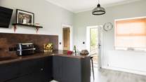Walk through the door into the stylish kitchen.