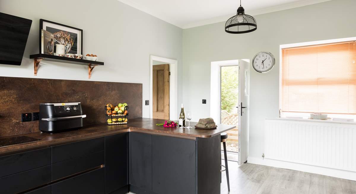 Walk through the door into the stylish kitchen.