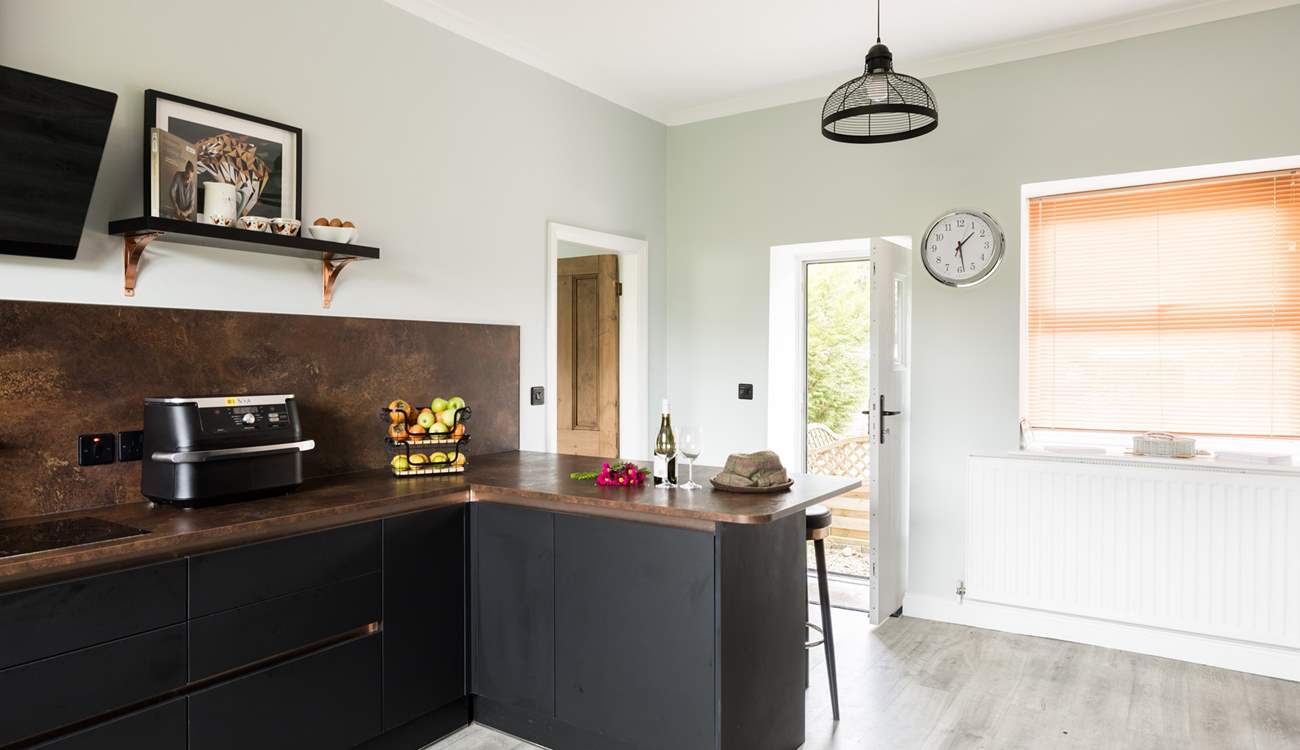 Walk through the door into the stylish kitchen.