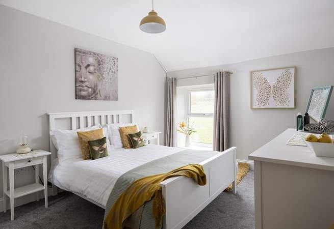 One of the four stylish bedrooms.