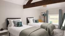 The spacious twin bedroom.