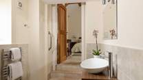 Peeking through from the en suite wet-room to the bedroom.
