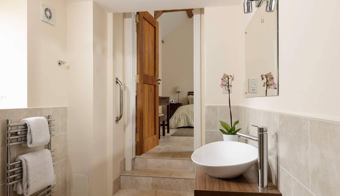 Peeking through from the en suite wet-room to the bedroom.