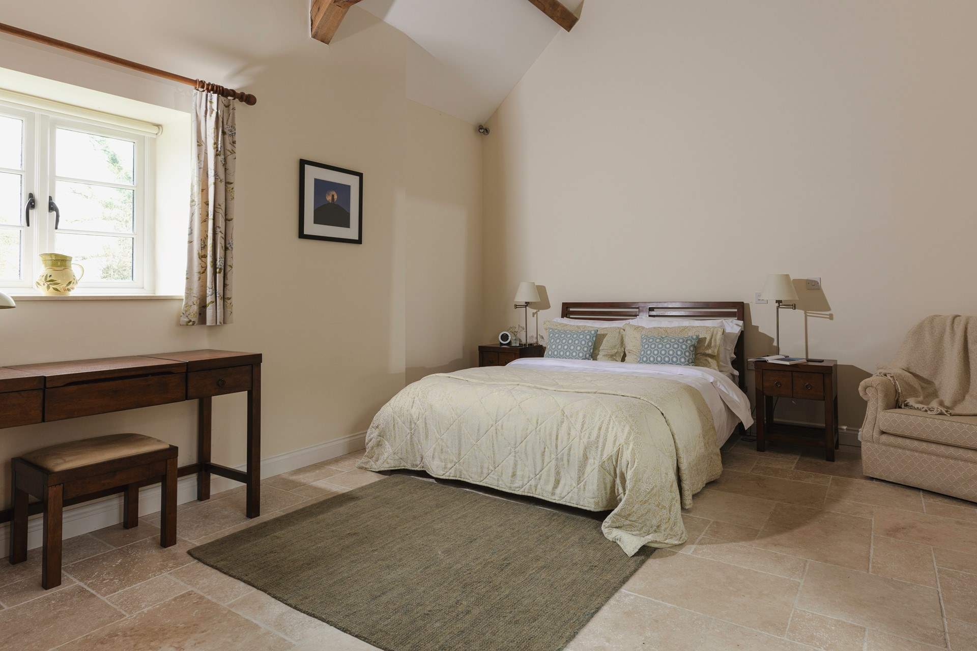 Calm tones in bedroom 1 ensure a peaceful retreat.