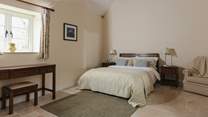 Calm tones in bedroom 1 ensure a peaceful retreat.