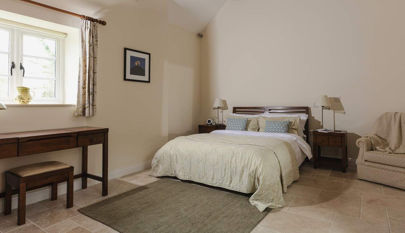 Calm tones in bedroom 1 ensure a peaceful retreat.