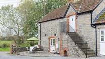 A beautifully converted barn that is detached and in the grounds of the owners' home.