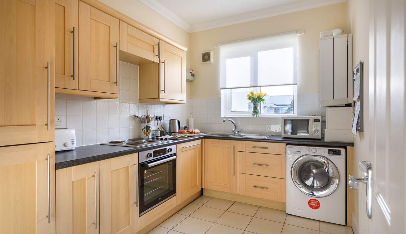 Cook up a hearty meal in the fully equipped kitchen.