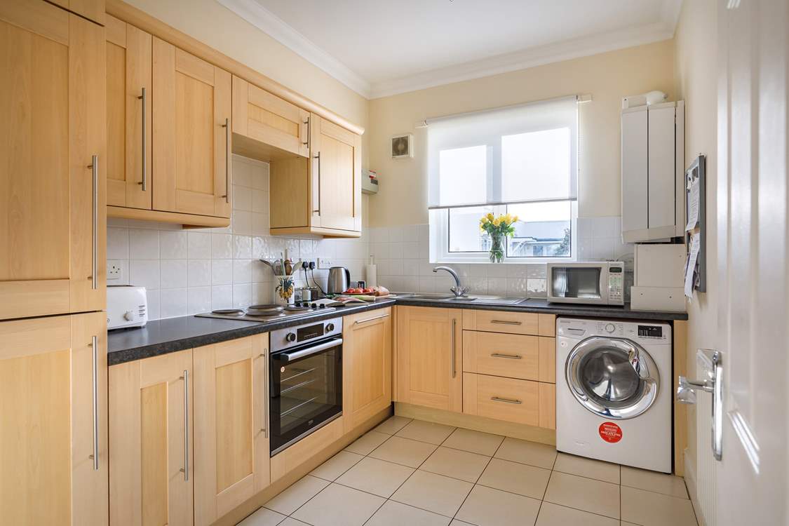 Cook up a hearty meal in the fully equipped kitchen.