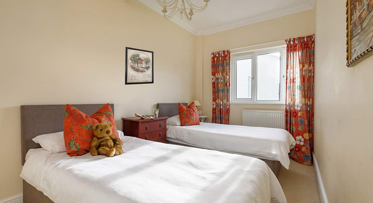 The twin bedroom is ideal for adults and children.