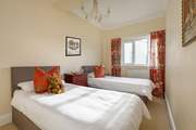 Bedroom 2  has a 'zip and link' bed, giving you the choice of a super-king double or twin beds, ideal for adults and children.