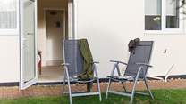 Enjoy a glass of vino on the lawns outside your private door at Sandy Shores.