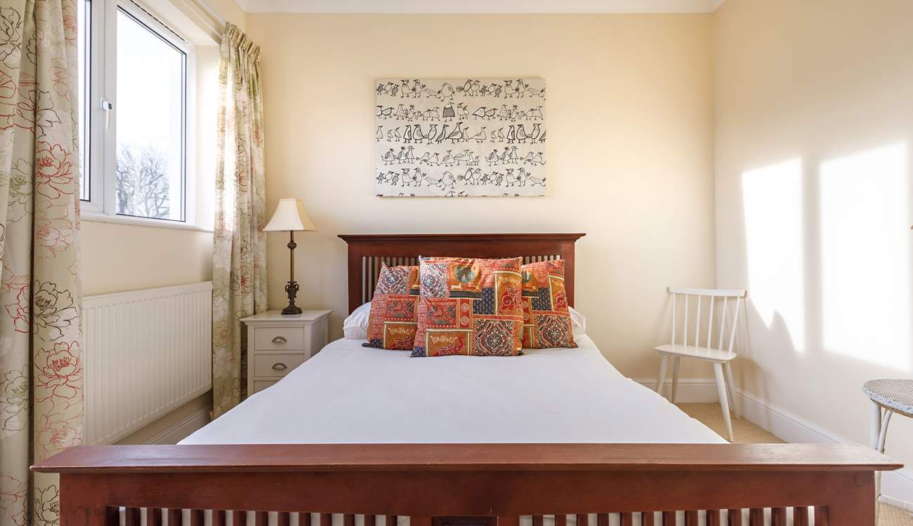 Enjoy peaceful lie-ins in this cosy double bedroom.