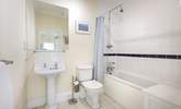 The family bathroom with bath and fitted shower. - Thumbnail Image