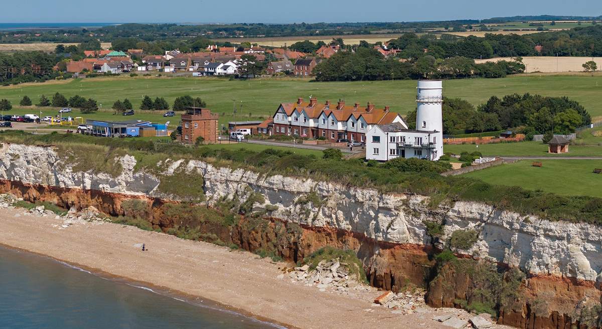 The iconic red and white striped cliffs of Hunstanton and its light house.