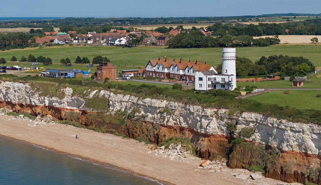 The iconic red and white striped cliffs of Hunstanton and its light house.
