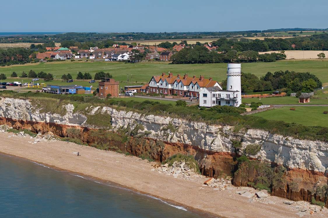 The iconic red and white striped cliffs of Hunstanton and its light house.