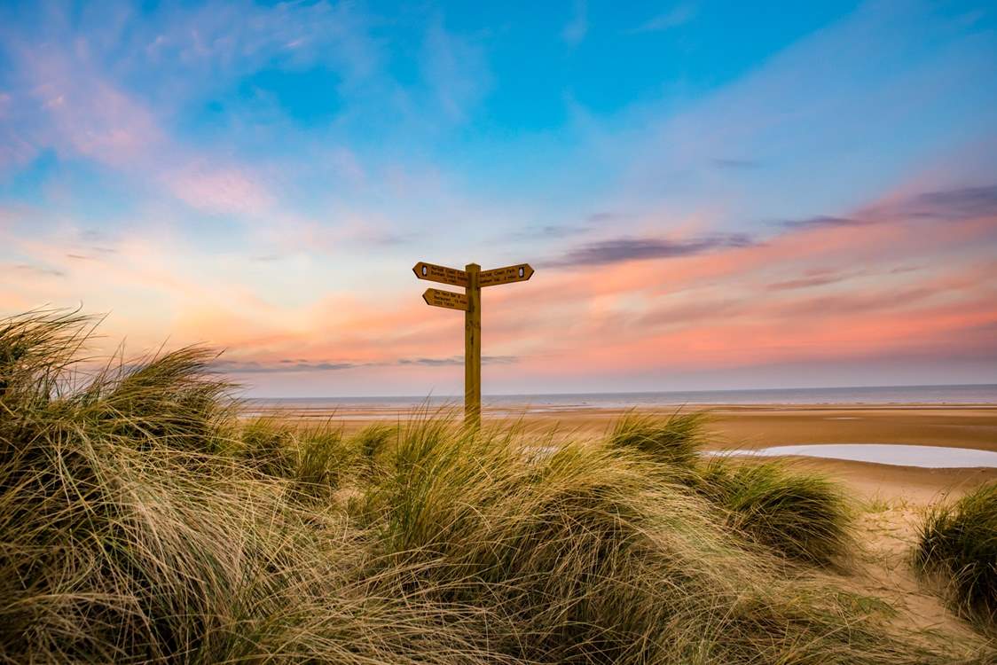 Explore the coastal paths and stunning landscapes from Sandy Shores on foot.