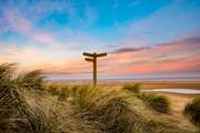 Explore the coastal paths and stunning landscapes from Sandy Shores on foot.