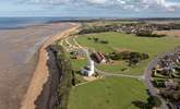 An aerial view of Hunstanton lighthouse and the changing tides of towards Old Hunstanton, minutes walk from Sandy Shores. - Thumbnail Image
