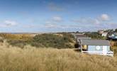 Explore the dunes and pretty pastel beach huts in Old Hunstanton, moments from your doorstep. - Thumbnail Image