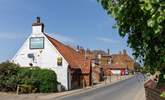 Visit the Ancient Mariner for a pint or supper on the vast lawn with views to the sea. - Thumbnail Image