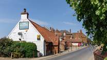 Visit the Ancient Mariner for a pint or supper on the vast lawn with views to the sea.