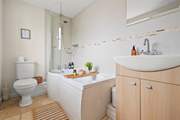 A soak in the tub in the family bathroom is the perfect way to rinse away the day's sand and sun cream.