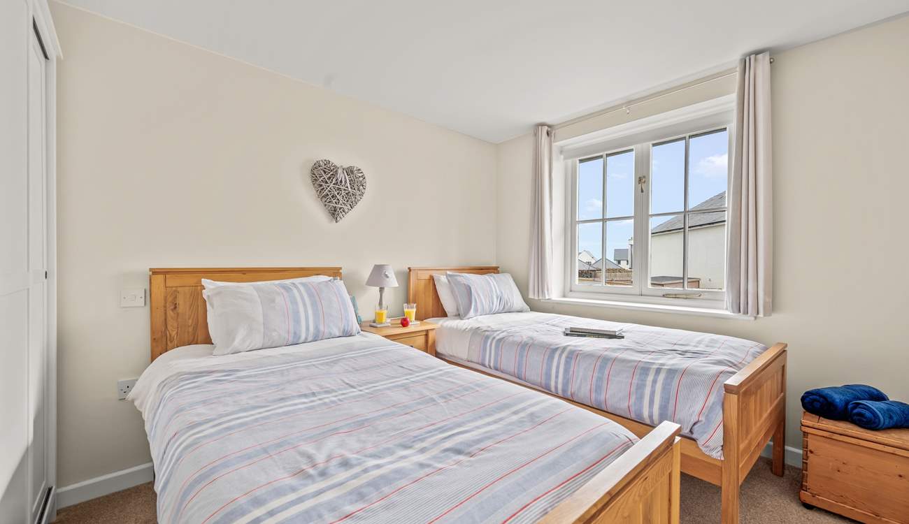 Bedroom 3 is home to this cute twin bed configuration.